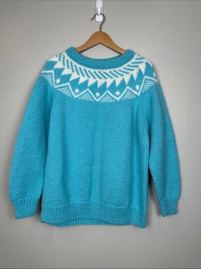 192. handknit fair aisle turquoise sweater.